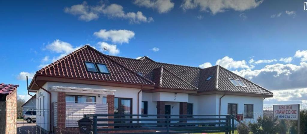 Pokoje Goscinne U Izy Łeba Exterior foto